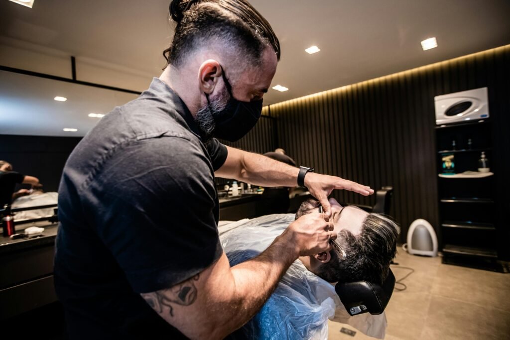 Barber doing a fade haircut in Surrey at Fade Club