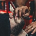 Barber doing a fade haircut in Surrey
