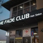Exterior view of The Fade Club barber shop in Surrey offering stylish haircuts.